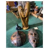 Collection of Hand-Carved Wooden African Masks and Sculptures
