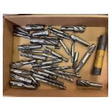 Assorted High-Speed Steel End Mills and Cutting Tools