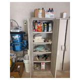 Storage Cabinet with Assorted Lubricants, Cleaning Supplies, and Household Items
