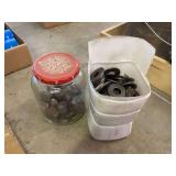 Assorted Metal Washers and Threaded Plugs in Containers