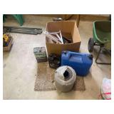 Assorted Workshop Supplies Including Preservative, Oil, Kerosene Container, and Shelf Brackets