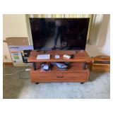 Samsung 43-Inch Crystal UHD TV with Media Stand and Bose Wave Music System