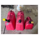 Set of Three Red Plastic Fuel Containers