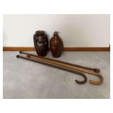 Assorted Decorative Items Including Ceramic Vase, Stoneware Jug, and Walking Canes