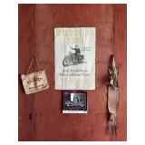 Collection of Motorcycle Memorabilia Including Desert Water Bag, Indian Motorcycle Poster, and Harley-Davidson Calendar