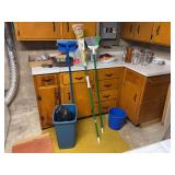 Assorted Household Cleaning Supplies, Glassware, and Decorative Items
