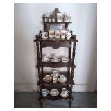 Four-Tier Wooden Display Stand with Assorted Commemorative Mugs and Teacups