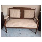 Wooden Settee with Floral Upholstery and Casters