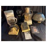 Kitchen Appliance Lot Including Cuisinart PRO Food Processor with Disc Holders, West Bend Coffee Maker, GE Coffee Maker, and Popcorn Popper
