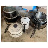 Assorted Cookware Collection Including Pots, Pans, and Enamelware