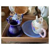 Assorted Ceramic Teapots, Pitchers, and Plates Collection