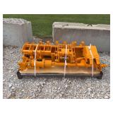 Yellow Construction Attachment Assembly on Pallet