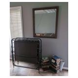 Assorted Technical Books, Folding Metal Cot, and Wood Framed Wall Mirror