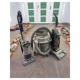 Assorted Vacuums Including Shark, Hoover WindTunnel, and Shop Vacuum