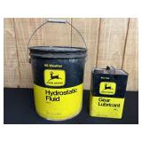 (2) John Deere Hydrostatic Fluid + Gear Lubricant Cans