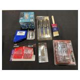 Assorted Hardware and Tool Lot Including Drill Bits, Chisel Set, and Garage Light