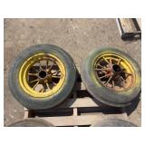 (2) 5.50-16 Mismatched Tires on John Deere Round Spoke Cut Off Wheels