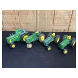 (4) 1/16 John Deere Tractors Ertl