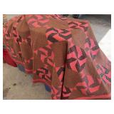 Handmade Quilt with Pinwheel Pattern in Red and Brown