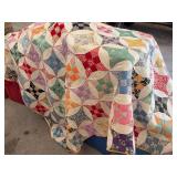 Handmade Cotton Patchwork Quilt with Multi-Colored Prints and Solid Yellow Backing