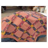 Handmade Floral Patchwork Quilt with Pink and Blue Prints
