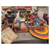 Assorted Collectible Toys and Games Lot Featuring Robots, Action Figures, and Board Games