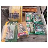 Assorted Action Figures Lot featuring NFL Starting Lineup, McFarlane SportsPicks, Mon-Sieur Bome, and Dirty Pair