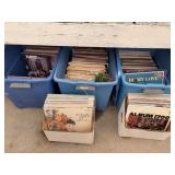 Large Assortment of Vinyl LP Records in Multiple Bins Featuring Classic Rock, Pop, and Spoken Word Albums