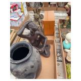 Assorted Home Decor Collection Featuring Statues, Mantel Clock, and Decorative Vase
