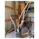 Metal Barrel With Assorted Pipes and Structural Metal