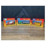 (3) 1/64 Trucks of the World NIB Ertl