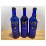 Three Skyy Vodka Bottles