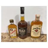 Lot of Three Whiskey Bottles: Jim Beam, George Dickel, and Yellowstone
