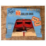 1/16 IH Disc NIB Ertl