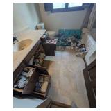 Assorted Bathroom Storage Unit with Organization Bins and Personal Care Supplies