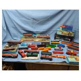 Large Collection of HO Scale Model Trains, Locomotives, Freight Cars, and Accessories with Original Boxes