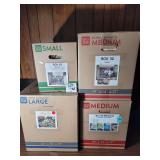 Assorted Gift Wrapping Supplies, Ribbons, Bows, and Holiday Decor Lot in Four Boxes