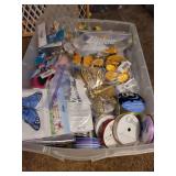 Assorted Craft Ribbons and Butterfly Decorations in Plastic Storage Tote