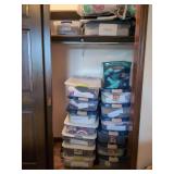 Assorted Women's Apparel in Plastic Storage Bins