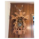 Carved Wooden Black Forest Cuckoo Clock with Deer Head and Dancing Figurines