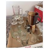 Assorted Glassware Lot Including Beer Mugs, Coffee Mugs, and Pint Milk Bottle