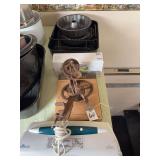 Kitchenware Assortment Including Seal-a-Meal, Pampered Chef Apple Peeler, Prep Solutions Onion Chopper, and Metal Bakeware