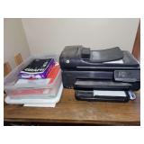HP Officejet 7500A Wide Format Printer with Paper and Notebooks in Storage Bin