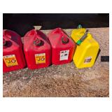Group of Four Fuel Cans Including Midwest Can 5-Gallon Gasoline Containers