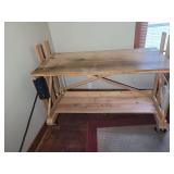Handcrafted Wooden Workbench with Lower Shelf and Power Strips