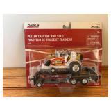 1/64 Case-IH Mighty Magnum Pulling Tractor + Sled Set NIB Ertl