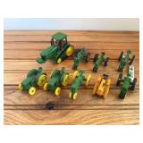 (9) 1/64 John Deere Tractors