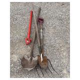 Assorted Garden Tools Including Shovels and Fork