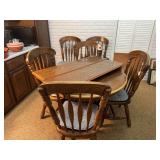 Wooden Pedestal Dining Table with Six Spindle Back Chairs
