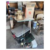 Fishing Equipment Collection including Rods, Reels, Tackle Box, and Accessories